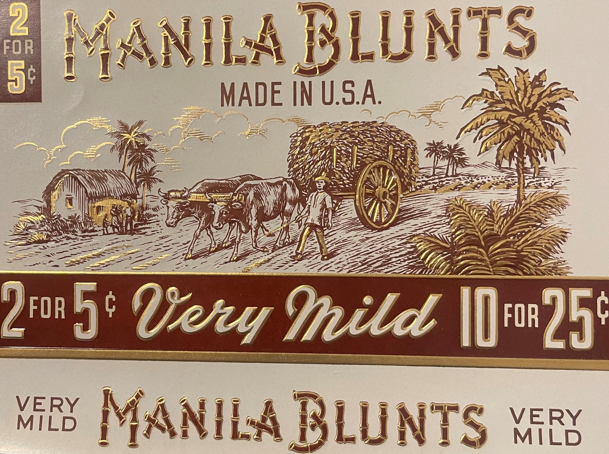 Antique Manila Blunts cigar label with embossed gold foil lithograph showing oxen cart and tropical scene, pricing text visib