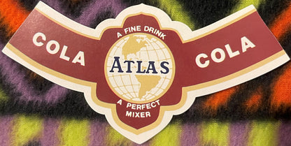 Vintage Atlas Cola label featuring a globe design, white and gold trim, and text reading "A Fine Drink," "A Perfect Mixer,"