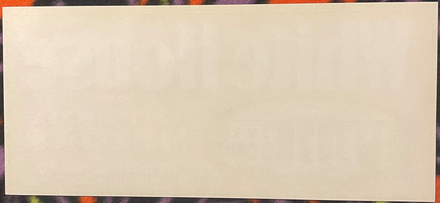Blank cream-colored vintage crate label with colorful patterned border featuring orange, purple, and green tones