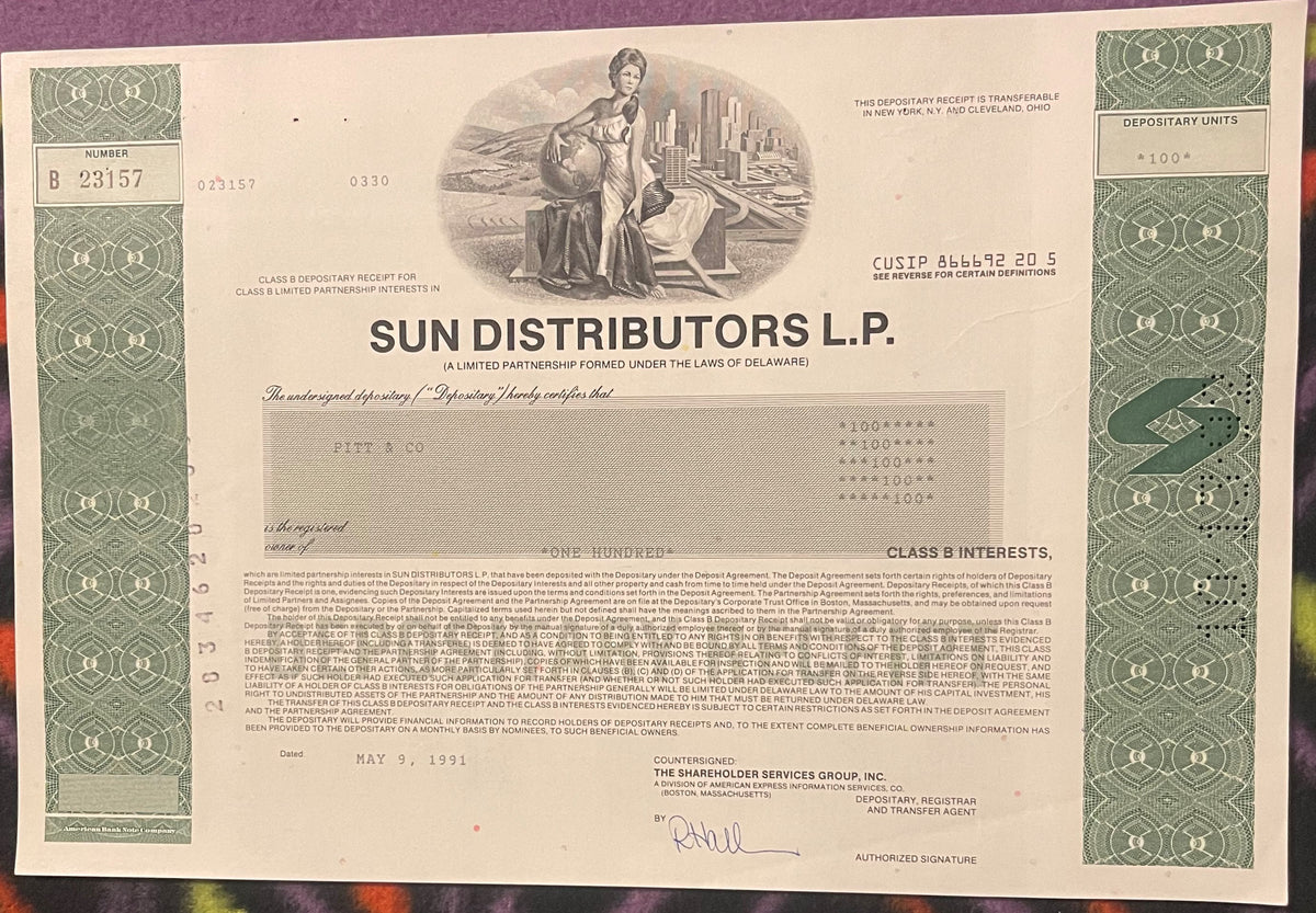 Sun Distributors L.P. Class B stock certificate with green decorative borders, allegorical female figure holding globe