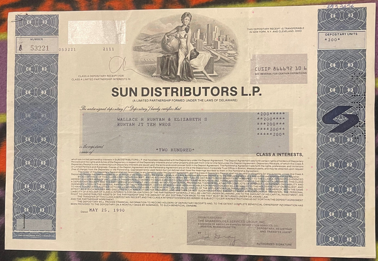 1990 Sun Distributors L.P. Class A Depositary Receipt stock cream colored with blue decorative bo
