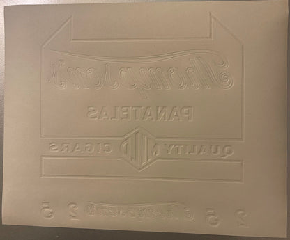 Cream-colored embossed cigar label with ornate decorative borders and text reading "Thompson's" and "Plantation" in relief
