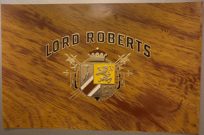 Gold embossed cigar label with "LORD ROBERTS" text, heraldic coat of arms with crown, and wood grain background texture