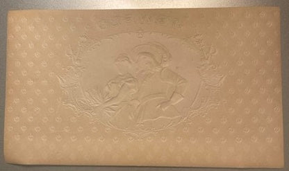 Tan embossed cigar label featuring a swashbuckler figure in relief against a dotted background pattern