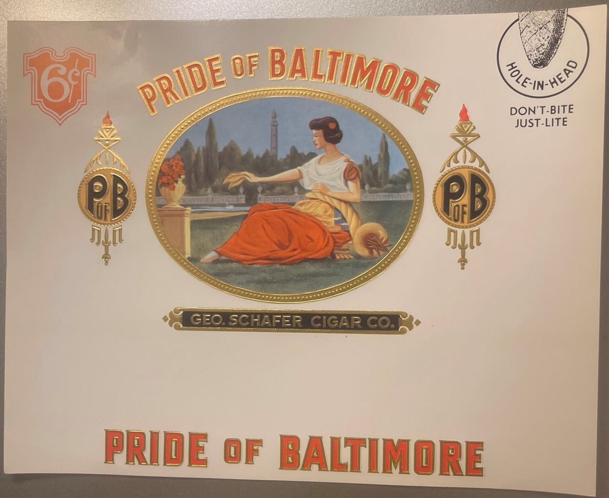 Vintage cigar label with gold foil embossing showing a woman in classical dress by a waterfront, "Pride of Baltimore" text, a
