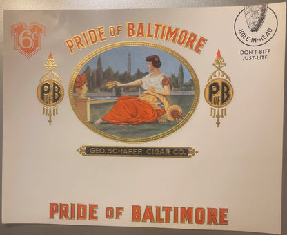 Vintage cigar label with gold foil embossing showing a woman in classical dress by a waterfront, "Pride of Baltimore" text, a