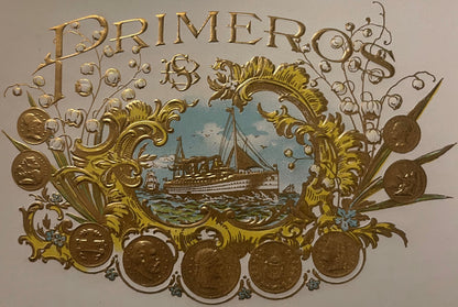 Embossed gold cigar label featuring "Primer" text, ornate scrollwork frame, steamship illustration, and decorative coins arou