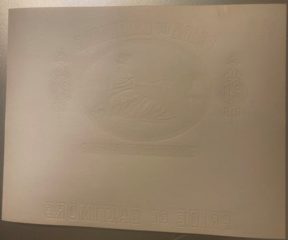 Embossed cream-colored cigar label with ornate oval centerpiece, decorative corner designs, and text reading "Pride of Baltim
