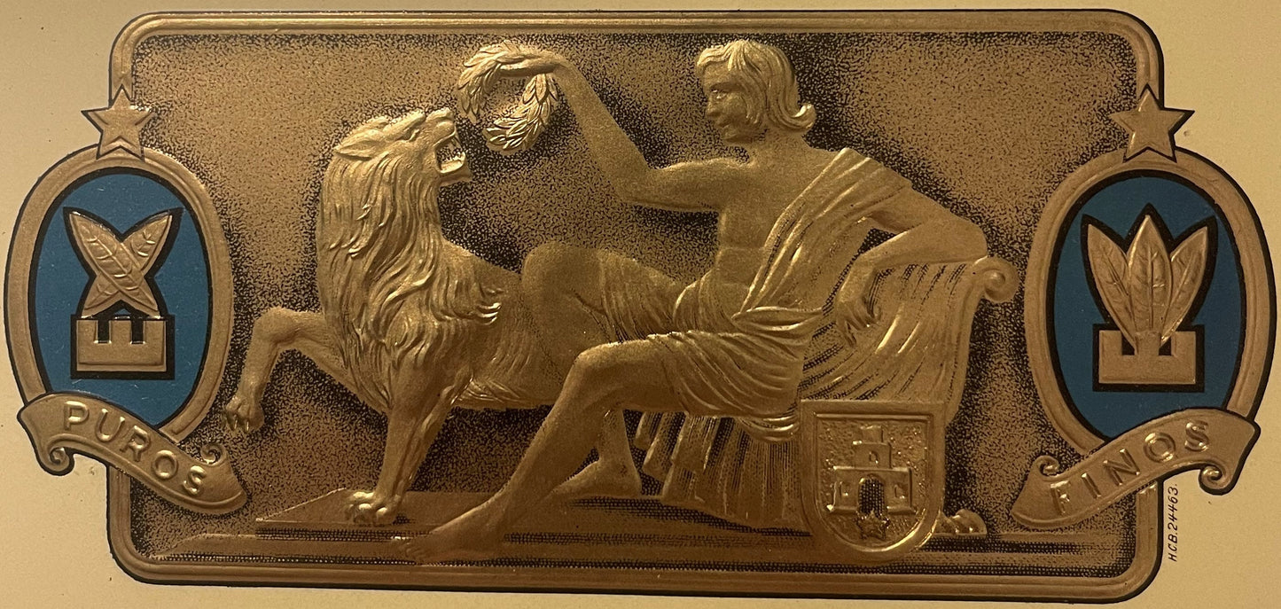 Gold embossed cigar label with classical figure and lion, blue medallions marked "PUROS" and "FINOS," stars and ornamental bo