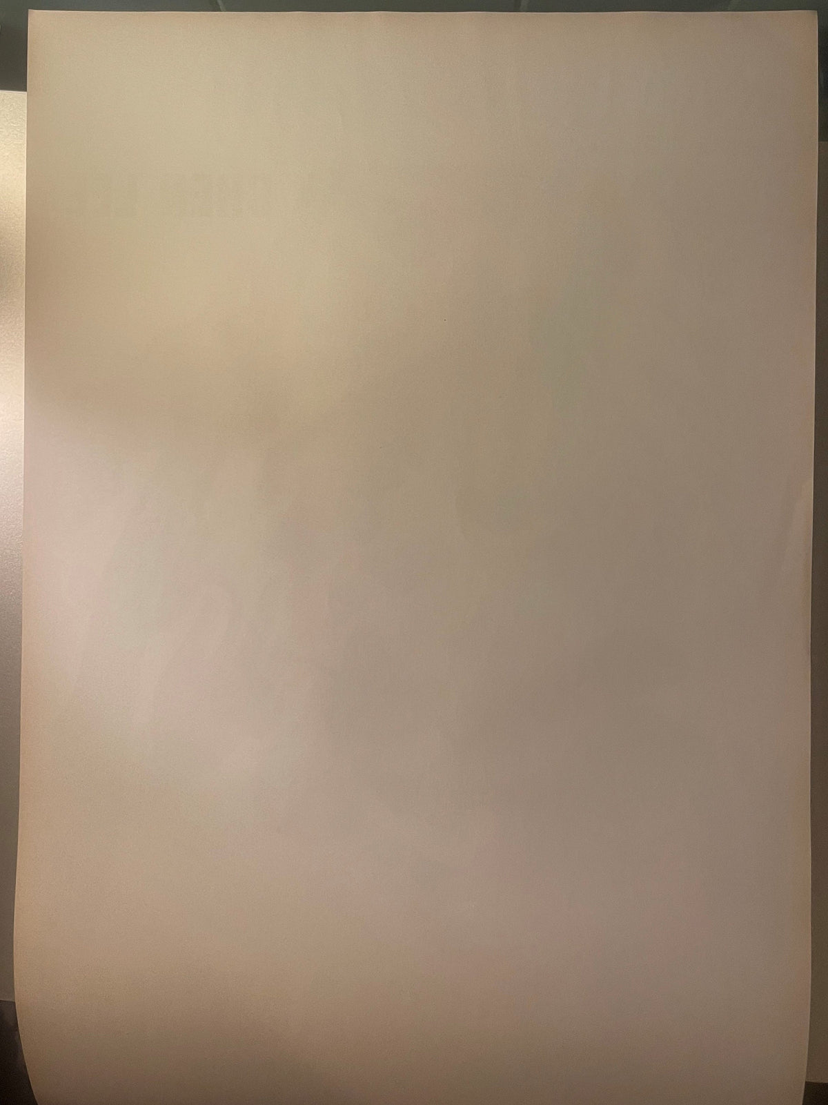 Blank cream-colored vintage movie poster sheet displayed flat against gray background with partial edge visible on left