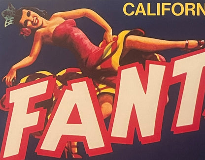 Vintage fruit crate label featuring a reclining woman in red dress with yellow accents against dark blue background, large re