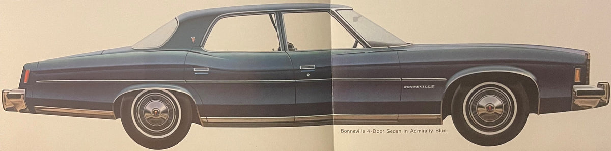 Side profile illustration of a 1974 Pontiac Bonneville 4-door sedan in Admiralty Blue with white-wall tires, shown against a beige background with model name and color printed below.