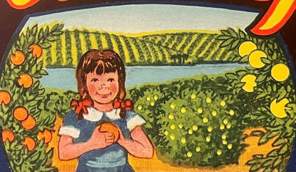 Vintage citrus crate label featuring a smiling girl with red hair bows holding oranges, surrounded by orange and lemon trees 