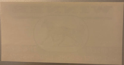 Blank cream-colored antique crate label with minimal visible text or imagery, shown at slight angle against neutral
