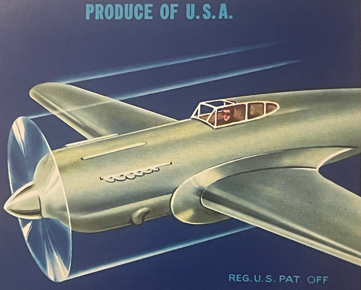 Vintage fruit crate label featuring a cream-colored propeller aircraft with "Produce of U.S.A." text and "Reg. U.S. Pat. Off"