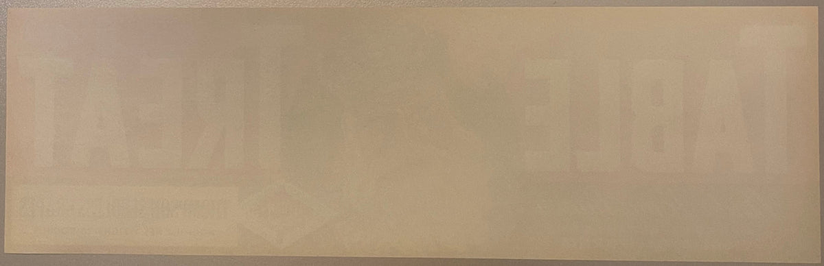 Back of the Table Treat grape crate label, plain cream paper with the front lettering faintly showing through in reverse