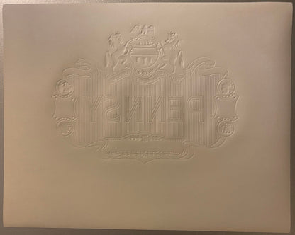 Cream-colored embossed cigar label with ornate heraldic crest, decorative horses and scrollwork, reading "PENNIED" in relief 
