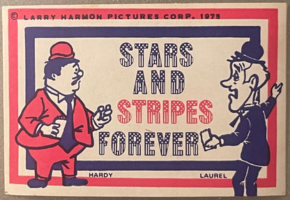 Vintage sticker featuring cartoon characters Hardy and Laurel in red and blue, with "Stars and Stripes Forever" text in patte