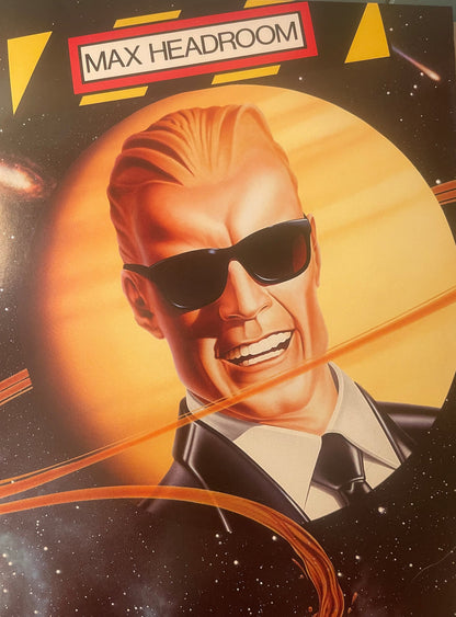 Vintage Max Headroom poster featuring illustrated man in sunglasses and suit against glowing orange sun with space theme, red