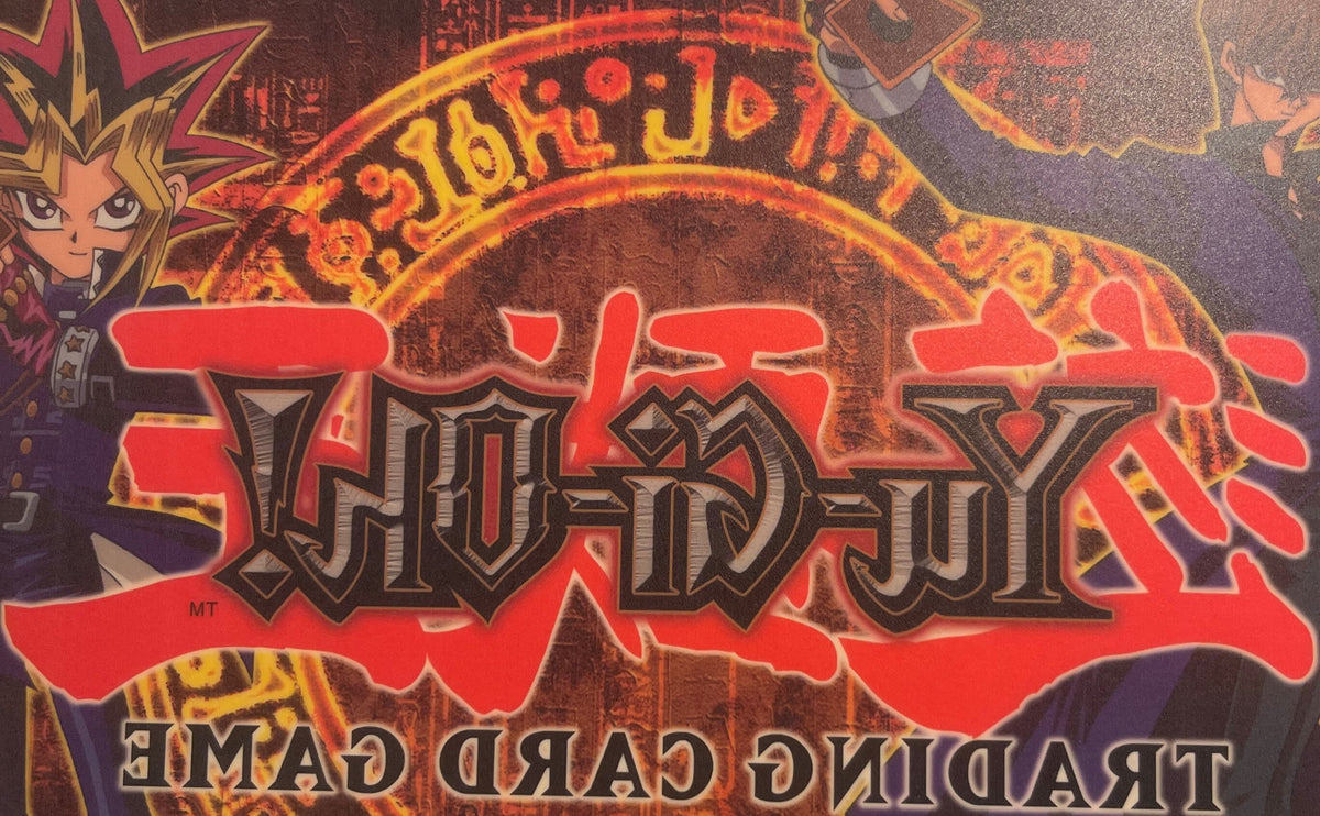 Red Yu-Gi-Oh! window cling with stylized metallic lettering and anime character artwork, displaying "Retro Trading Card Game"