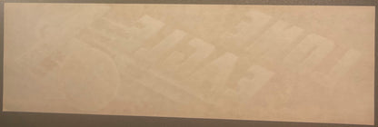 Faded vintage fruit crate label with embossed eagle design and text, displayed flat against neutral background