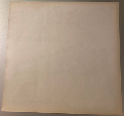 Back of the King's Cadets asparagus label, blank paper with the front printing faintly showing through in reverse