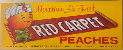 Vintage peach crate label with smiling genie character on red magic carpet against yellow background, "Mountain Air Fresh Red