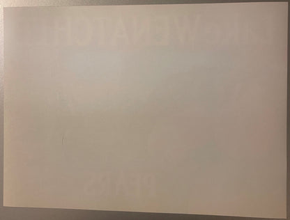 Blank cream-colored vintage crate label on neutral background, showing minimal visible printing or graphics