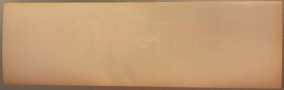 Blank reverse side of an antique crate label, tan/brown paper, red background.