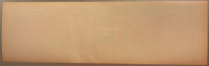 Blank reverse side of an antique crate label, tan/brown paper, red background.