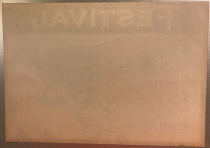 Aged tan paper with faint watermark text, possibly a vintage fruit crate label, photographed flat against neutral background
