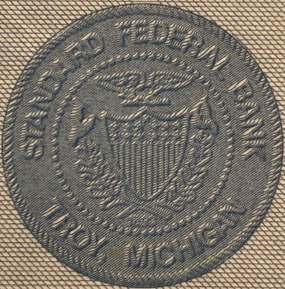 Close-up of engraved eagle vignette from vintage bank stock certificate with fine line hatching background