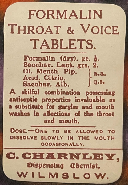 Cream-colored vintage pharmacy label for Formalin Throat & Voice Tablets by C. Charnley, Dispensing Chemist, Wilmslow, with b