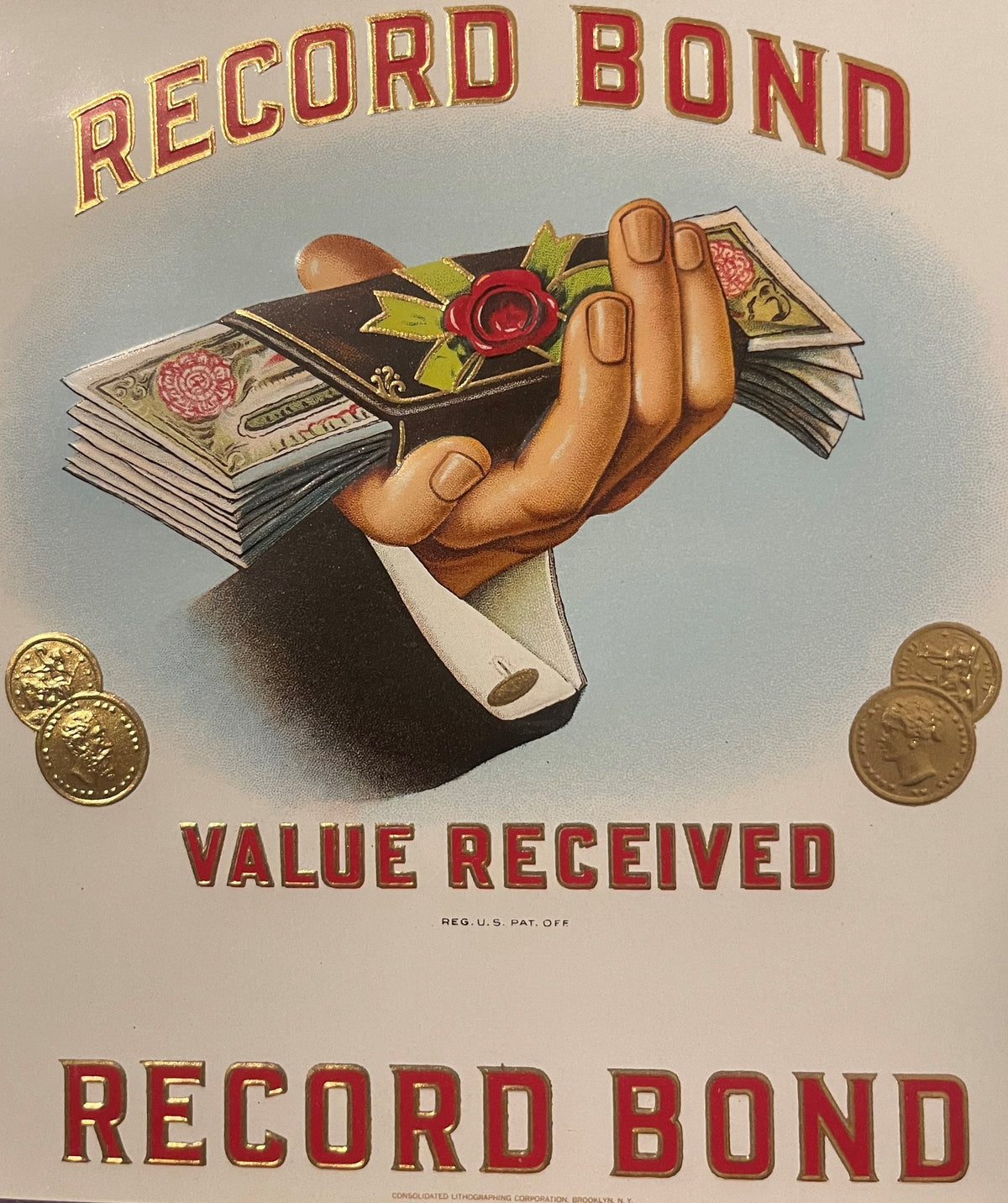 Antique cigar label with hand holding stacked currency and rose, "Record Bond" text in red and gold lettering, gold coins visible at corners.