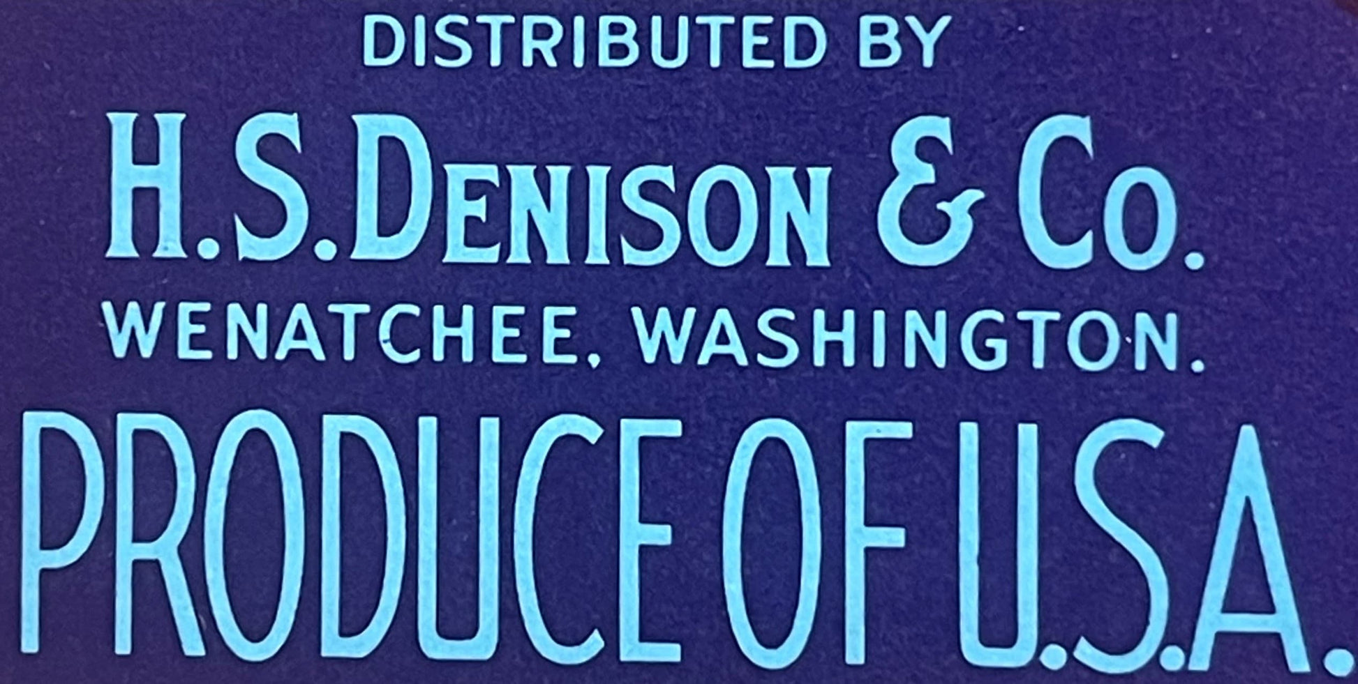 Vintage crate label with cyan text on dark purple background reading "Distributed by H.S. Denison & Co., Wenatchee, Washingto