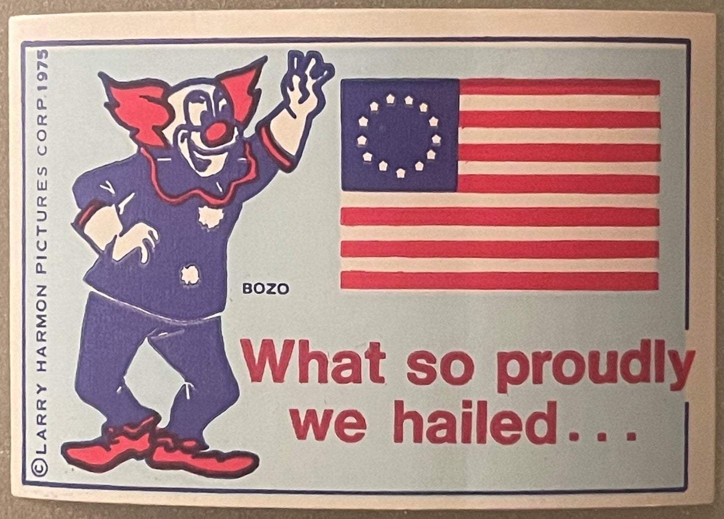 Vintage 1975 Bozo the Clown bicentennial sticker with clown character and 13-star American flag on cream background