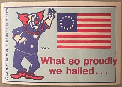 Vintage 1975 Bozo the Clown bicentennial sticker with clown character and 13-star American flag on cream background