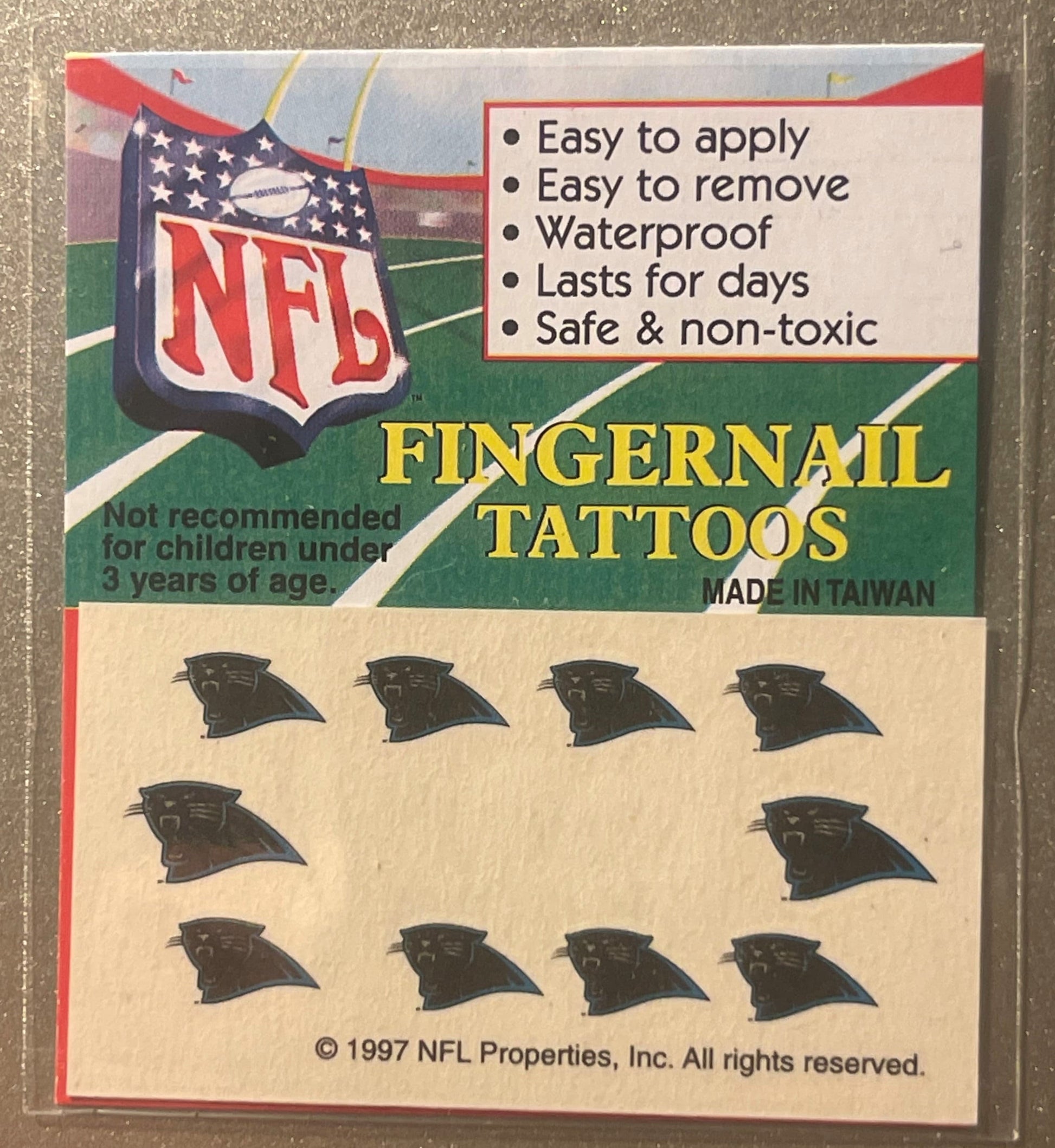 Vintage 1997 NFL Carolina Panthers fingernail tattoos package showing black panther head designs and product features on crea