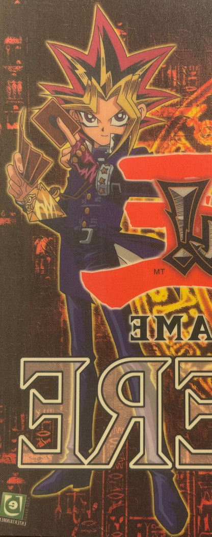 Vintage Yu-Gi-Oh! window cling featuring Yugi with spiky hair holding a card, red star burst background, red and gold