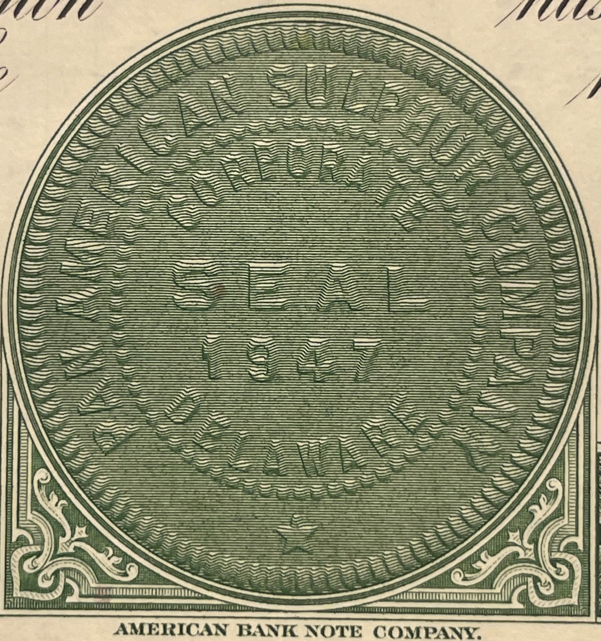 Green engraved circular vignette from American Bank Note Company, featuring ornate decorative corners, printed on aged cream 