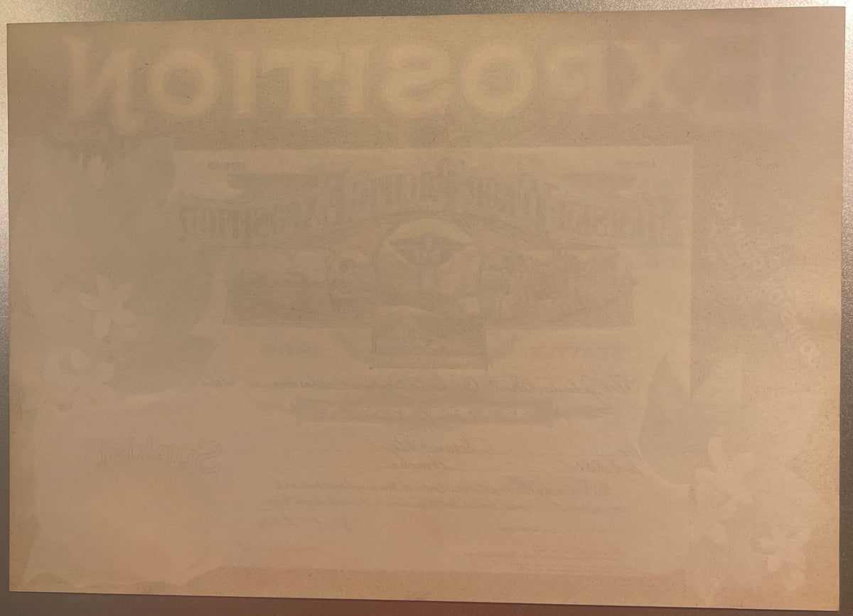 Faded antique lemon crate label with embossed text mentioning Alaska-Yukon-Pacific Fair and Santa Barbara, displayed flat on 