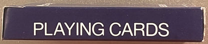 Close-up of dark blue box top with white text reading "PLAYING CARDS