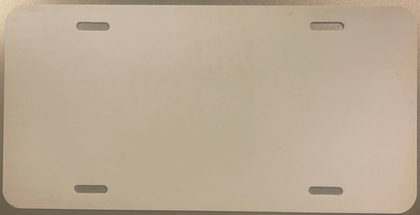 Blank cream-colored license plate with four gray mounting holes, front view