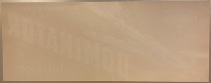 Back of the horizontal Dominator Tomatoes label, blank paper with the front lettering showing through in reverse