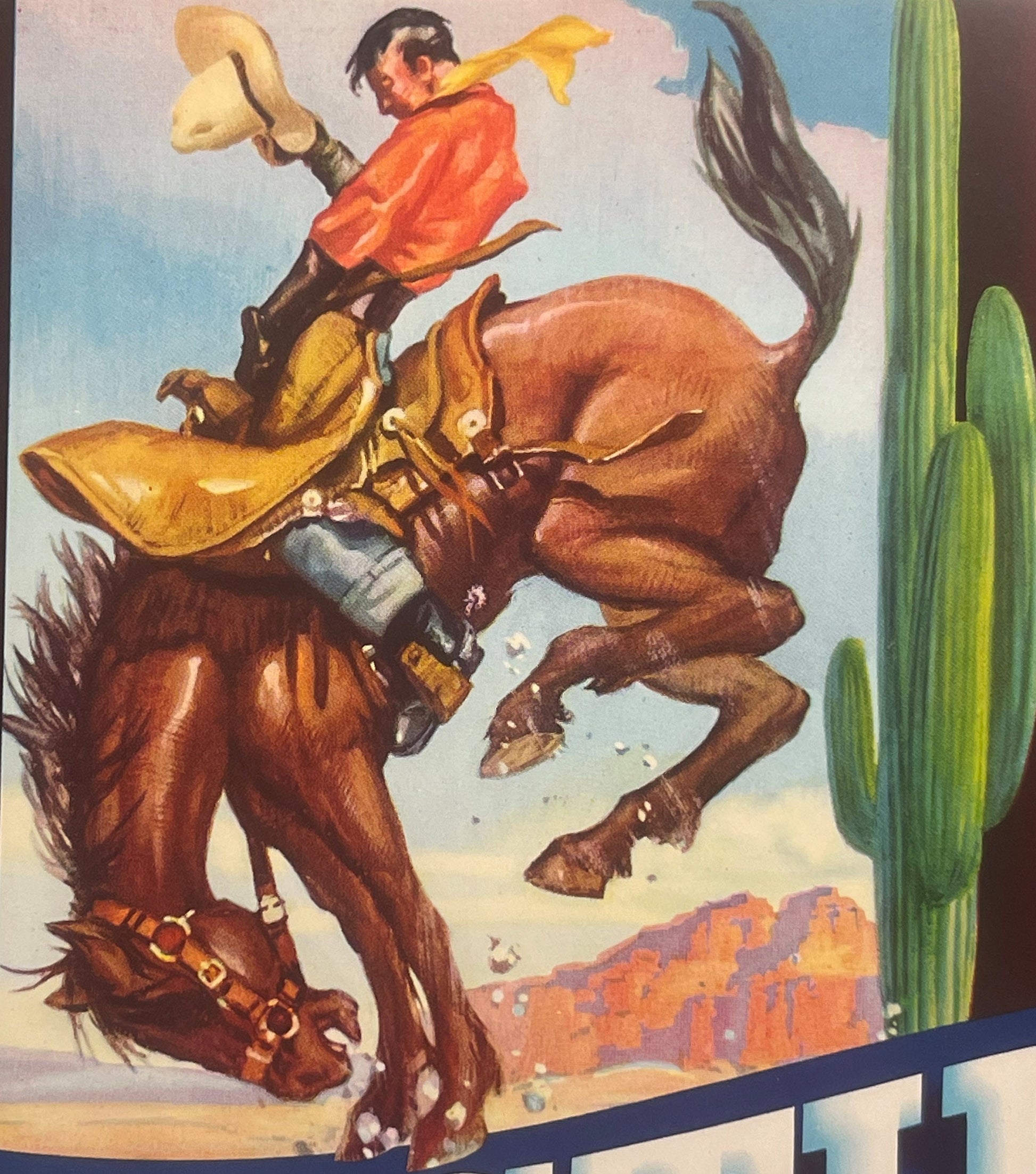 Vintage crate label featuring a cowboy in red shirt riding a bucking brown horse with yellow saddle blanket, desert landscape