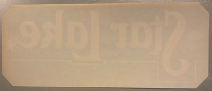 Blank back of the Star Lake crate label with the front lettering showing through in reverse