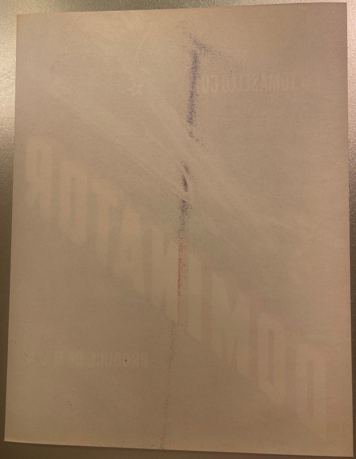 Back of the upright Dominator label, blank paper with the front lettering showing through in reverse