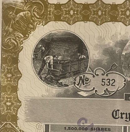 Ornate stock featuring circular vignette of miners working underground with cart, decorative gold border