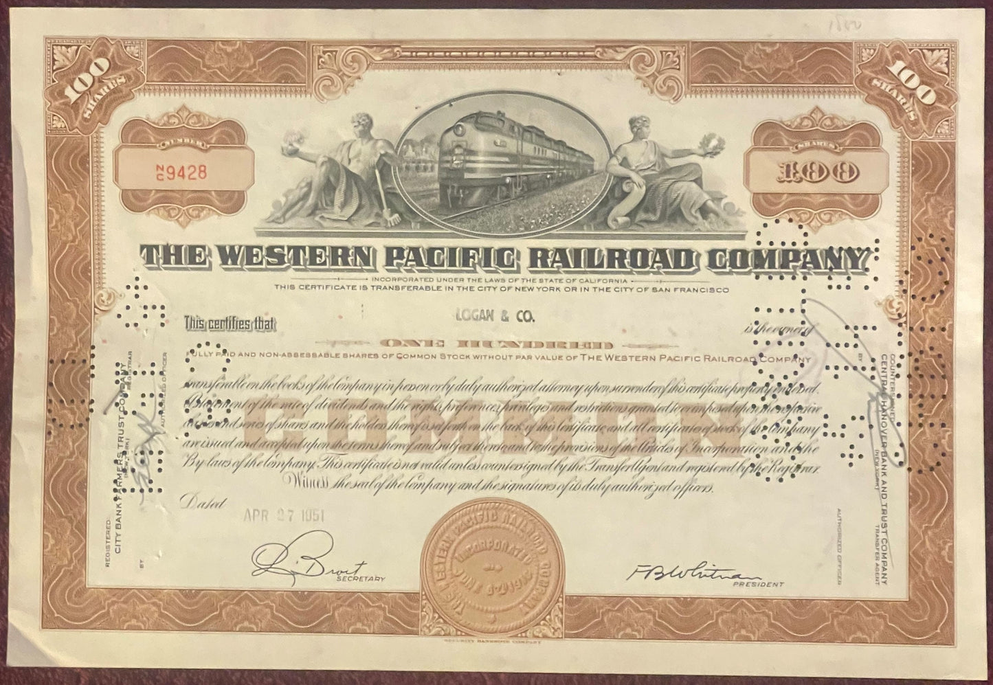 Vintage Western Pacific Railroad Company stock certificate from, featuring brown ornamental borders, central locomotive