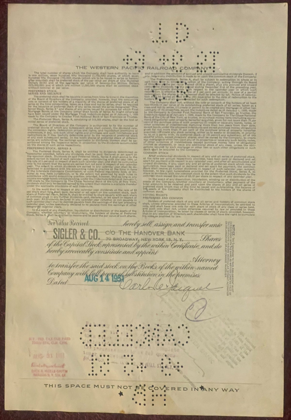 Vintage Western Pacific Railroad stock certificate, with printed text and punch-hole cancellation marks